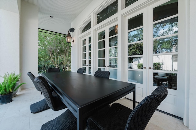 1069 Kirby Dr, Houston, TX 77019 - view of patio with french doors and outdoor dining space