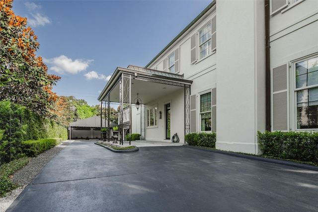 1069 Kirby Dr, Houston, TX 77019 - view of front of house featuring stucco siding
