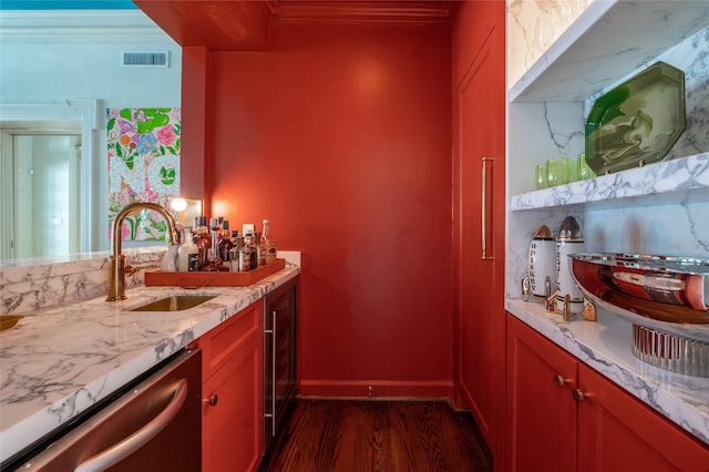 1069 Kirby Dr, Houston, TX 77019 - indoor wet bar with dishwasher, dark wood-type flooring, crown molding, and beverage cooler