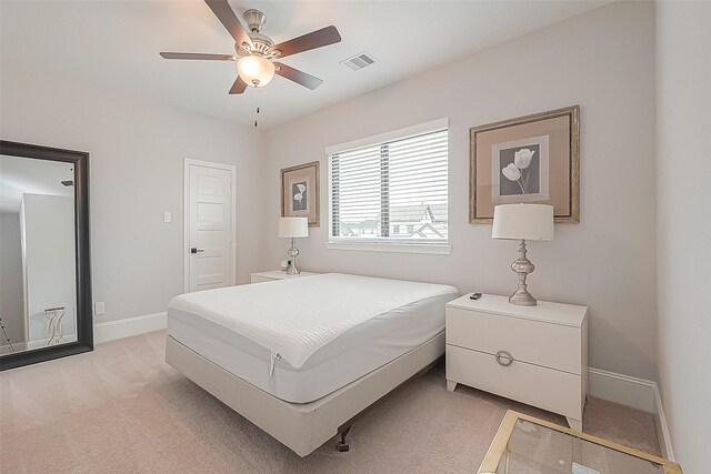 2201 Mulberry Ridge Ct, Manvel, TX 77578 - bedroom featuring light colored carpet and a ceiling fan