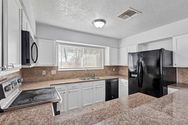 1602 Evesham Dr, Houston, TX 77015 - kitchen with black appliances, a textured ceiling, tasteful backsplash, and white cabinetry