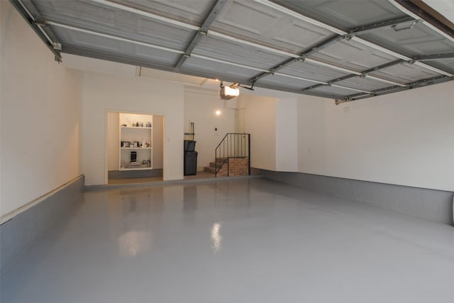 12859 Kingsbridge Ln, Houston, TX 77077 - garage with a garage door opener