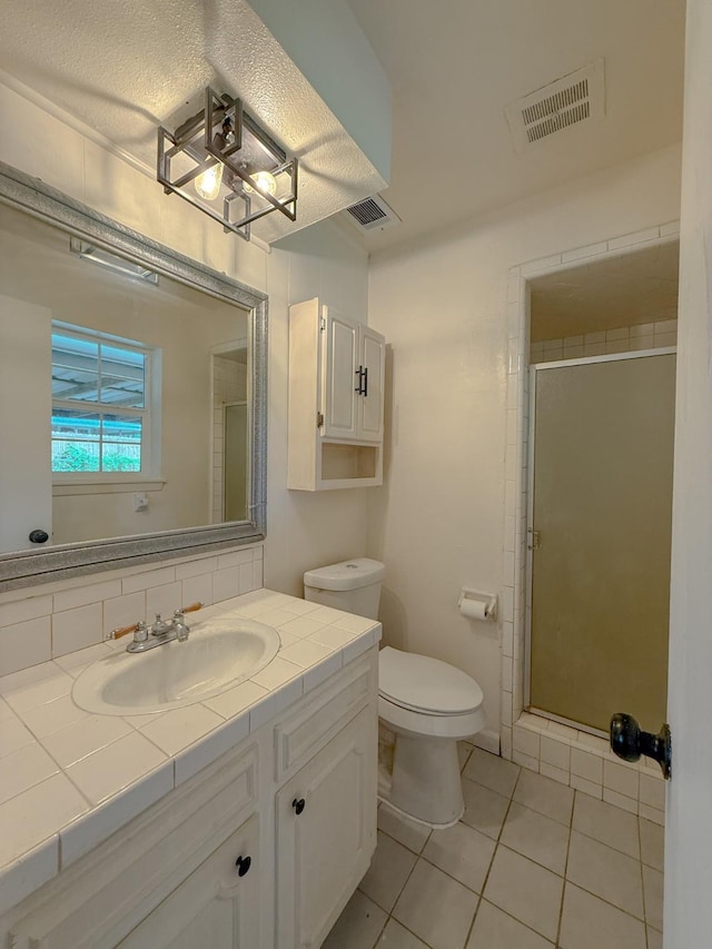 20 Woods Ln, Coldspring, TX 77331 - bathroom with tile patterned flooring, vanity, and a shower stall