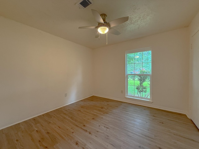 20 Woods Ln, Coldspring, TX 77331 - empty room featuring light wood-type flooring and a ceiling fan