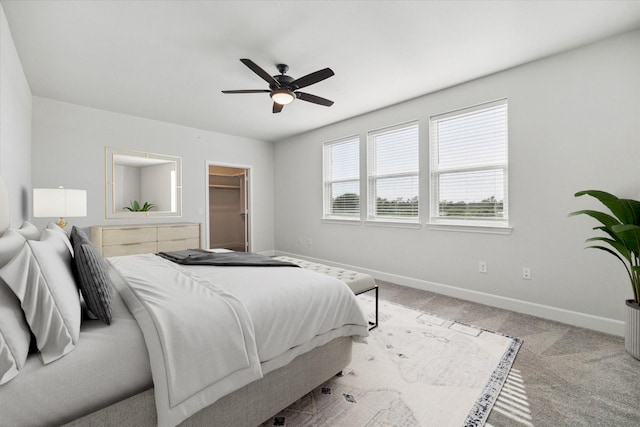 6804 Westview Dr Unit 1407, Houston, TX 77055 - bedroom with a spacious closet, carpet floors, and a ceiling fan