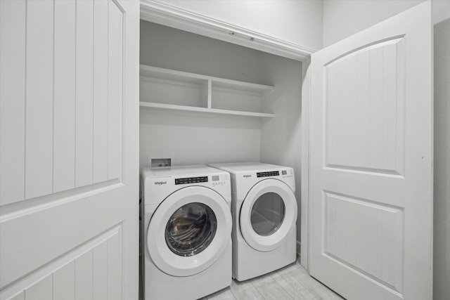 6804 Westview Dr Unit 1407, Houston, TX 77055 - washroom featuring separate washer and dryer