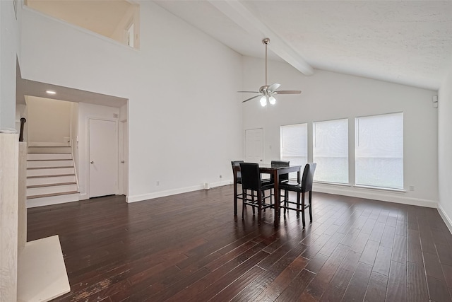 12230 Southmeadow Dr, Stafford, TX 77477 - dining space featuring a ceiling fan, dark wood-style floors, high vaulted ceiling, stairs, and beamed ceiling