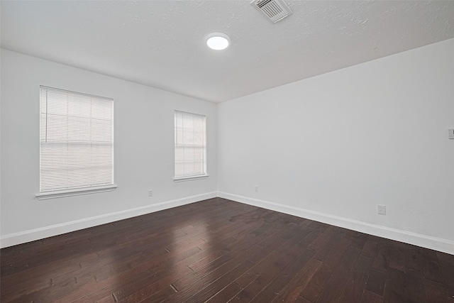 12230 Southmeadow Dr, Stafford, TX 77477 - unfurnished room featuring dark wood-style flooring