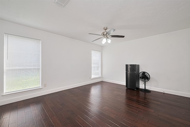 12230 Southmeadow Dr, Stafford, TX 77477 - unfurnished room with a ceiling fan and wood finished floors