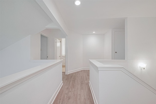 12230 Southmeadow Dr, Stafford, TX 77477 - hallway featuring an upstairs landing, light wood finished floors, and recessed lighting