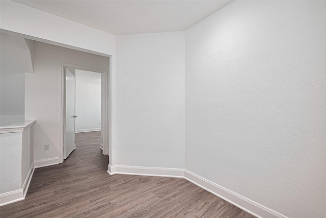 12230 Southmeadow Dr, Stafford, TX 77477 - empty room with dark wood-style flooring
