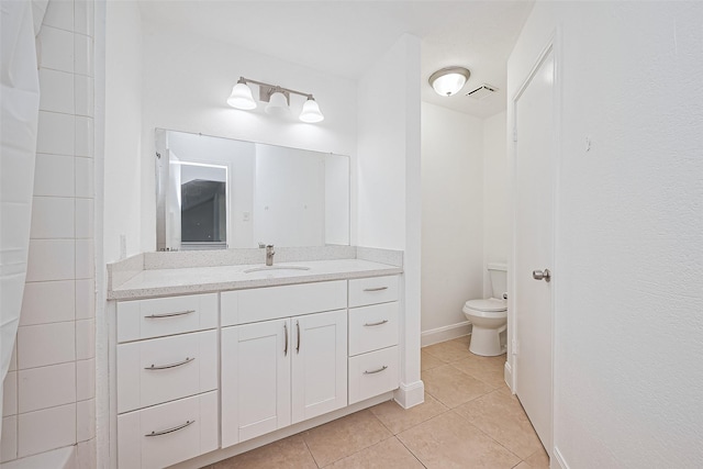 12230 Southmeadow Dr, Stafford, TX 77477 - bathroom with tile patterned flooring and vanity