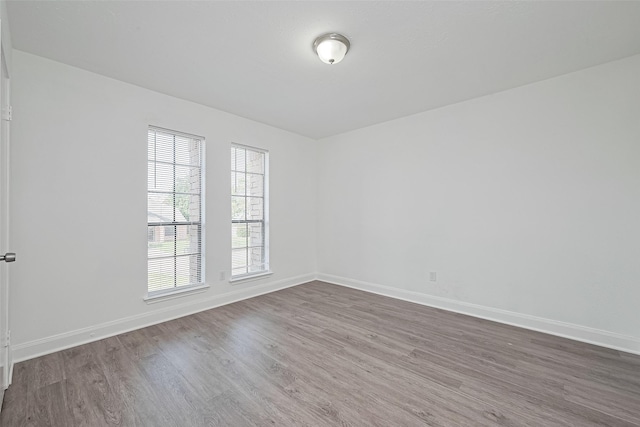 12230 Southmeadow Dr, Stafford, TX 77477 - empty room with wood finished floors