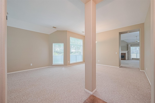 38 Barn Lantern Pl, The Woodlands, TX 77382 - carpeted empty room with baseboards and vaulted ceiling