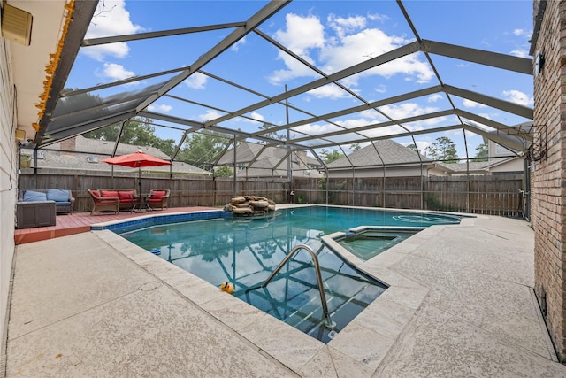 12414 Laneview Dr, Houston, TX 77070 - view of pool with an outdoor hangout area, a fenced backyard, a pool with connected hot tub, and a lanai