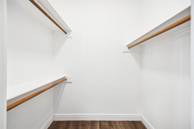 12414 Laneview Dr, Houston, TX 77070 - spacious closet featuring dark wood finished floors