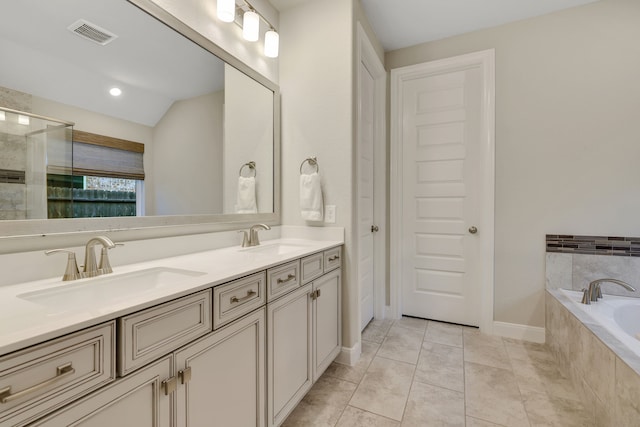 21310 Baldovin Way, Tomball, TX 77375 - bathroom featuring double vanity, a garden tub, a tile shower, tile patterned floors, and vaulted ceiling