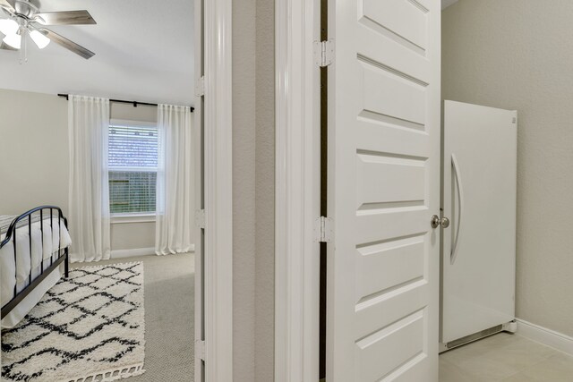 21310 Baldovin Way, Tomball, TX 77375 - bedroom with freestanding refrigerator and a ceiling fan