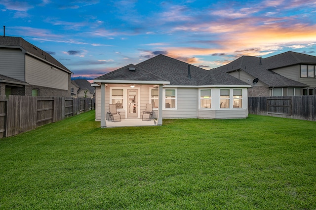 21310 Baldovin Way, Tomball, TX 77375 - back of house featuring a patio, roof with shingles, and a fenced backyard