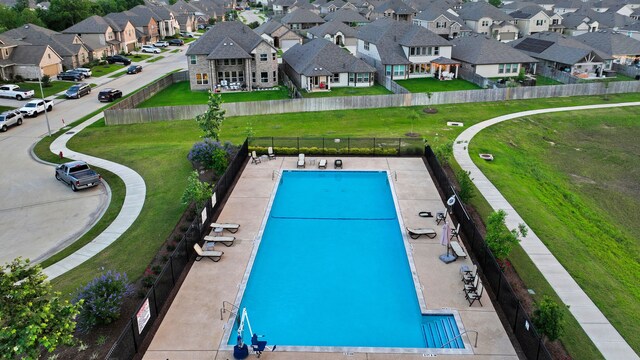 21310 Baldovin Way, Tomball, TX 77375 - view of swimming pool featuring a residential view