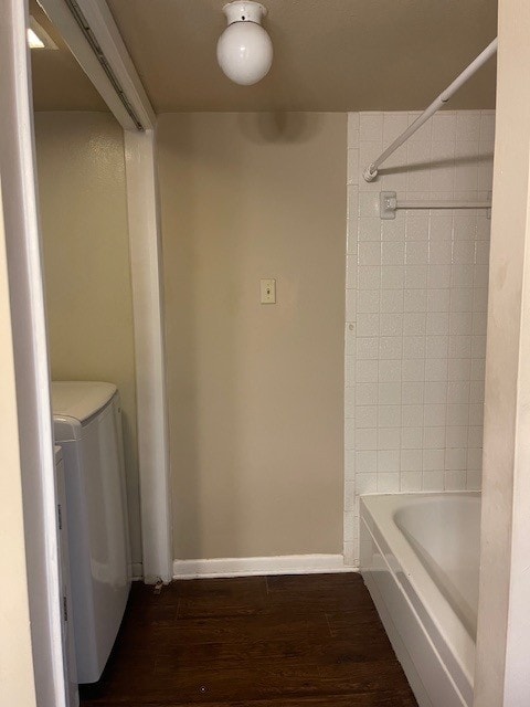 8515 Hearth Dr Unit 36, Houston, TX 77054 - laundry room featuring dark wood finished floors and independent washer and dryer