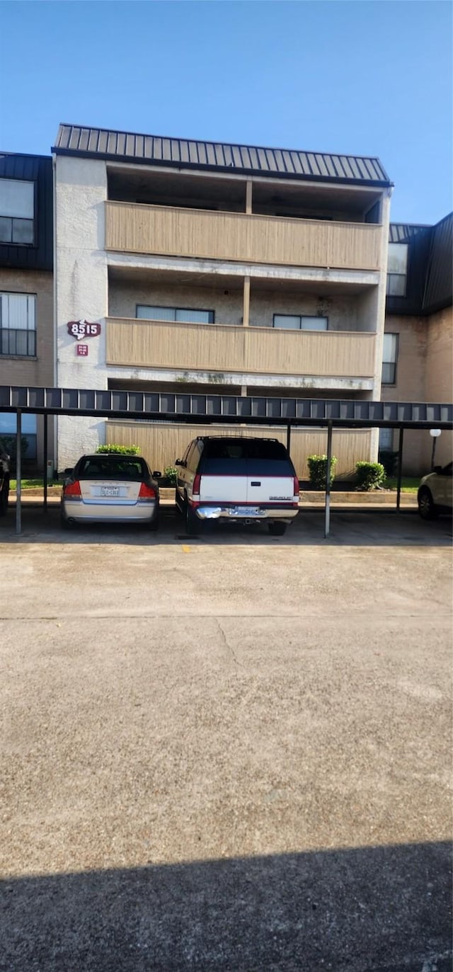 8515 Hearth Dr Unit 36, Houston, TX 77054 - view of building exterior with covered parking