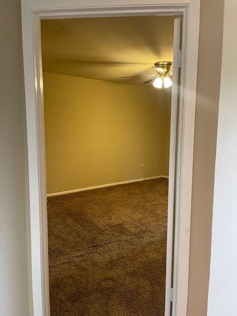 8515 Hearth Dr Unit 36, Houston, TX 77054 - unfurnished room featuring carpet and ceiling fan