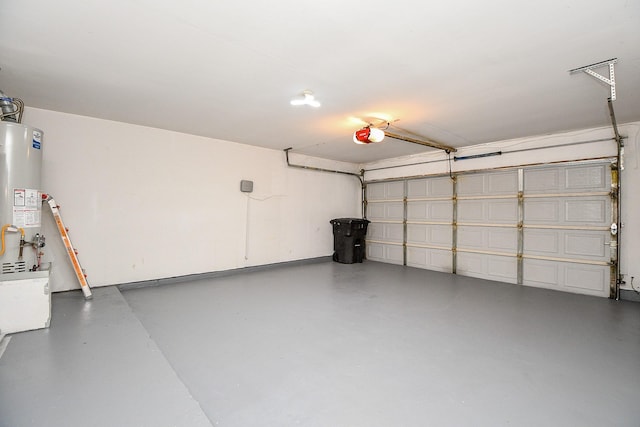 11707 Turtle Lake Dr, Houston, TX 77064 - garage featuring gas water heater and a garage door opener