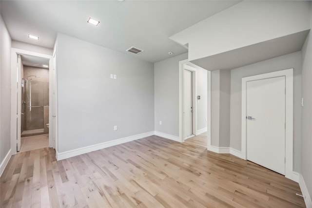 1111 W 21st St, Houston, TX 77008 - empty room featuring light wood-style flooring and baseboards
