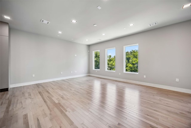 1111 W 21st St, Houston, TX 77008 - unfurnished room featuring light wood finished floors and recessed lighting
