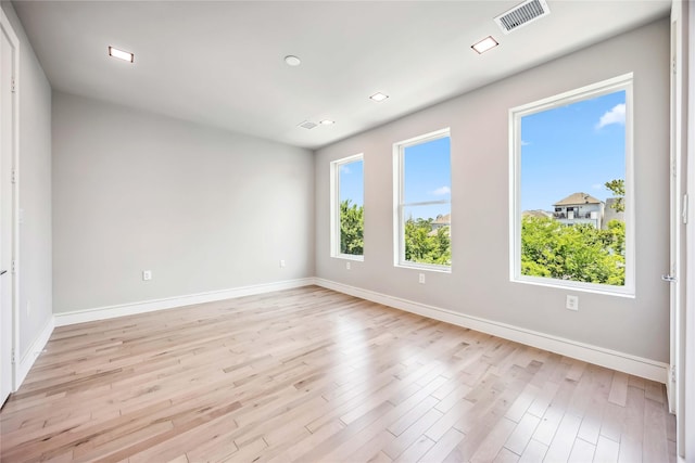1111 W 21st St, Houston, TX 77008 - unfurnished room featuring light wood-style floors and recessed lighting