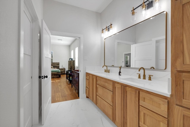 630 S Railroad Ave, Shepherd, TX 77371 - full bathroom with marble finish flooring and double vanity