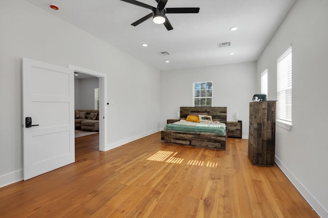 630 S Railroad Ave, Shepherd, TX 77371 - bedroom with light wood-style floors, ceiling fan, and recessed lighting