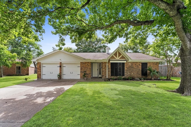 2014 17th St N, Texas City, TX 77590 - ranch-style house with a garage, driveway, and brick siding