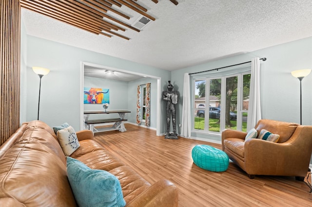 2014 17th St N, Texas City, TX 77590 - living area featuring wood finished floors and a textured ceiling
