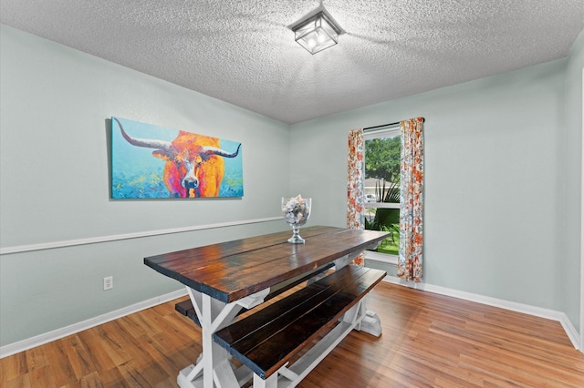 2014 17th St N, Texas City, TX 77590 - dining room with wood finished floors and a textured ceiling