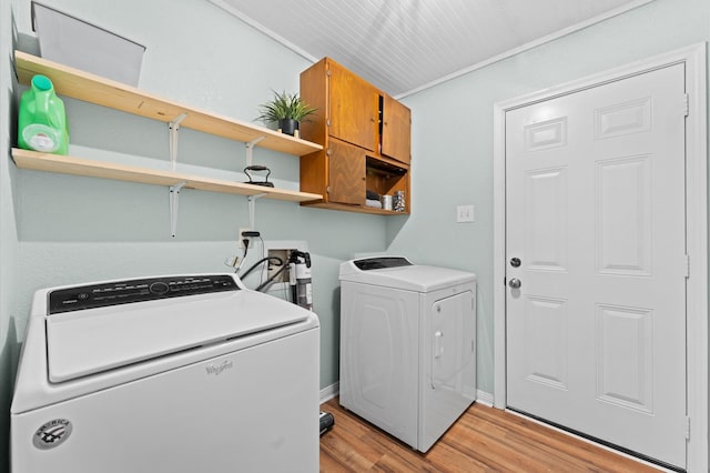 2014 17th St N, Texas City, TX 77590 - laundry area with separate washer and dryer and light wood-type flooring