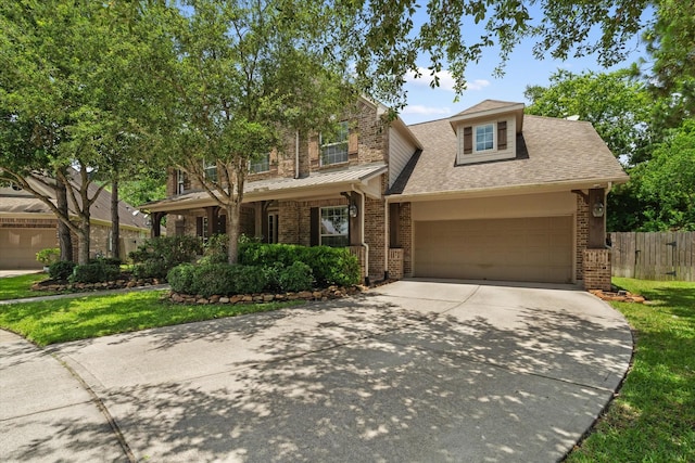 15602 Shining Brook Ct, Houston, TX 77044 - traditional home featuring brick siding, driveway, a garage, and a shingled roof