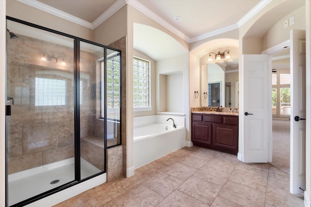 15602 Shining Brook Ct, Houston, TX 77044 - full bath featuring vanity, a garden tub, plenty of natural light, crown molding, and a shower stall