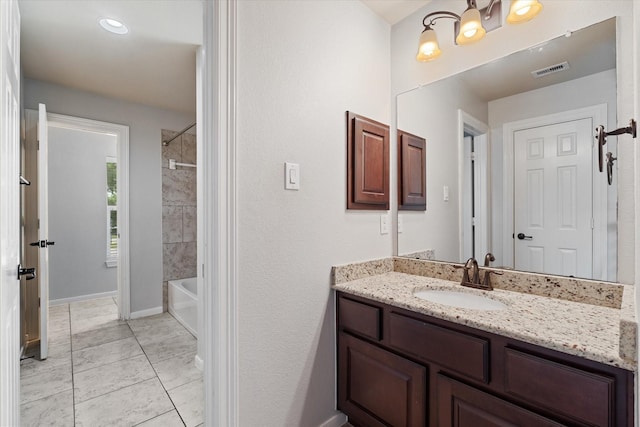 15602 Shining Brook Ct, Houston, TX 77044 - full bathroom with vanity, marble finish flooring, and tub / shower combination