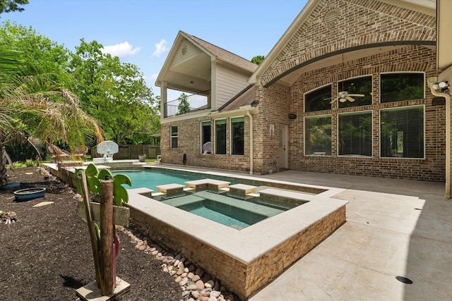 15602 Shining Brook Ct, Houston, TX 77044 - view of swimming pool featuring a ceiling fan, a patio area, and a pool with connected hot tub