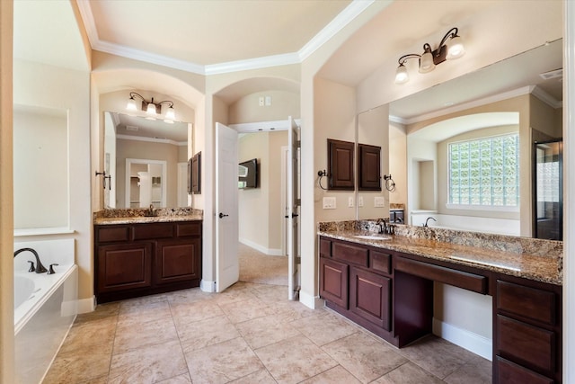 15602 Shining Brook Ct, Houston, TX 77044 - bathroom featuring ornamental molding, a bath, two vanities, an enclosed shower, and tile patterned flooring