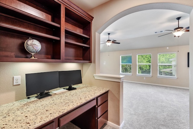 15602 Shining Brook Ct, Houston, TX 77044 - office area featuring ceiling fan, arched walkways, and light carpet