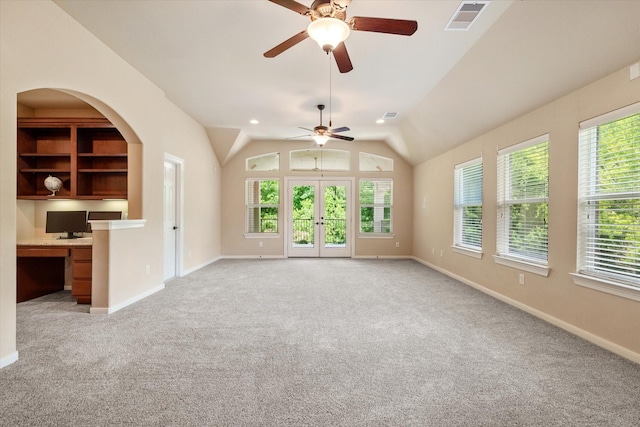 15602 Shining Brook Ct, Houston, TX 77044 - unfurnished living room with healthy amount of natural light, a ceiling fan, light colored carpet, and vaulted ceiling
