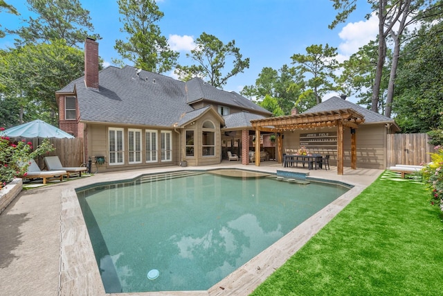 13306 Golden Valley Dr, Cypress, TX 77429 - rear view of property with a pergola, a chimney, a patio area, and a shingled roof