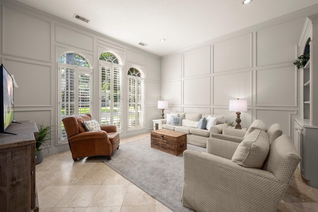 13306 Golden Valley Dr, Cypress, TX 77429 - living room featuring a decorative wall and recessed lighting