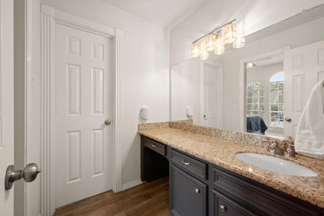 13306 Golden Valley Dr, Cypress, TX 77429 - bathroom featuring vanity and wood finished floors