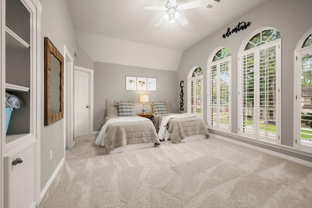13306 Golden Valley Dr, Cypress, TX 77429 - carpeted bedroom featuring multiple windows, lofted ceiling, and ceiling fan
