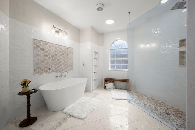 13306 Golden Valley Dr, Cypress, TX 77429 - full bathroom featuring tile walls, a soaking tub, and walk in shower