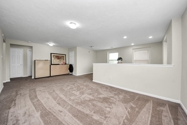 19110 Remington Springs Dr, Houston, TX 77073 - below grade area with carpet and recessed lighting